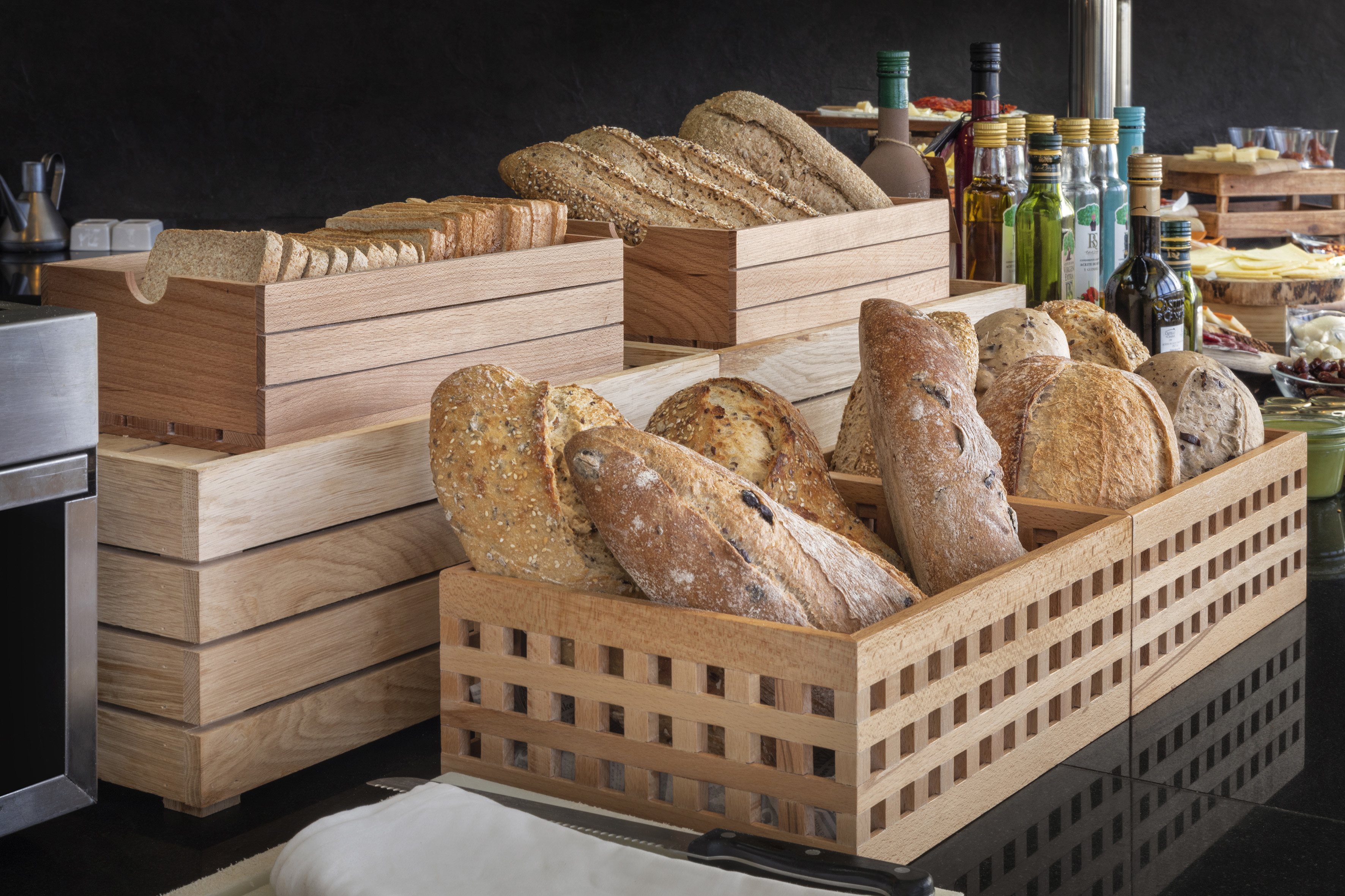 a group of wooden baskets of bread