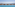 Luxury resort infinity pool with daybeds, ocean, and mountain view.