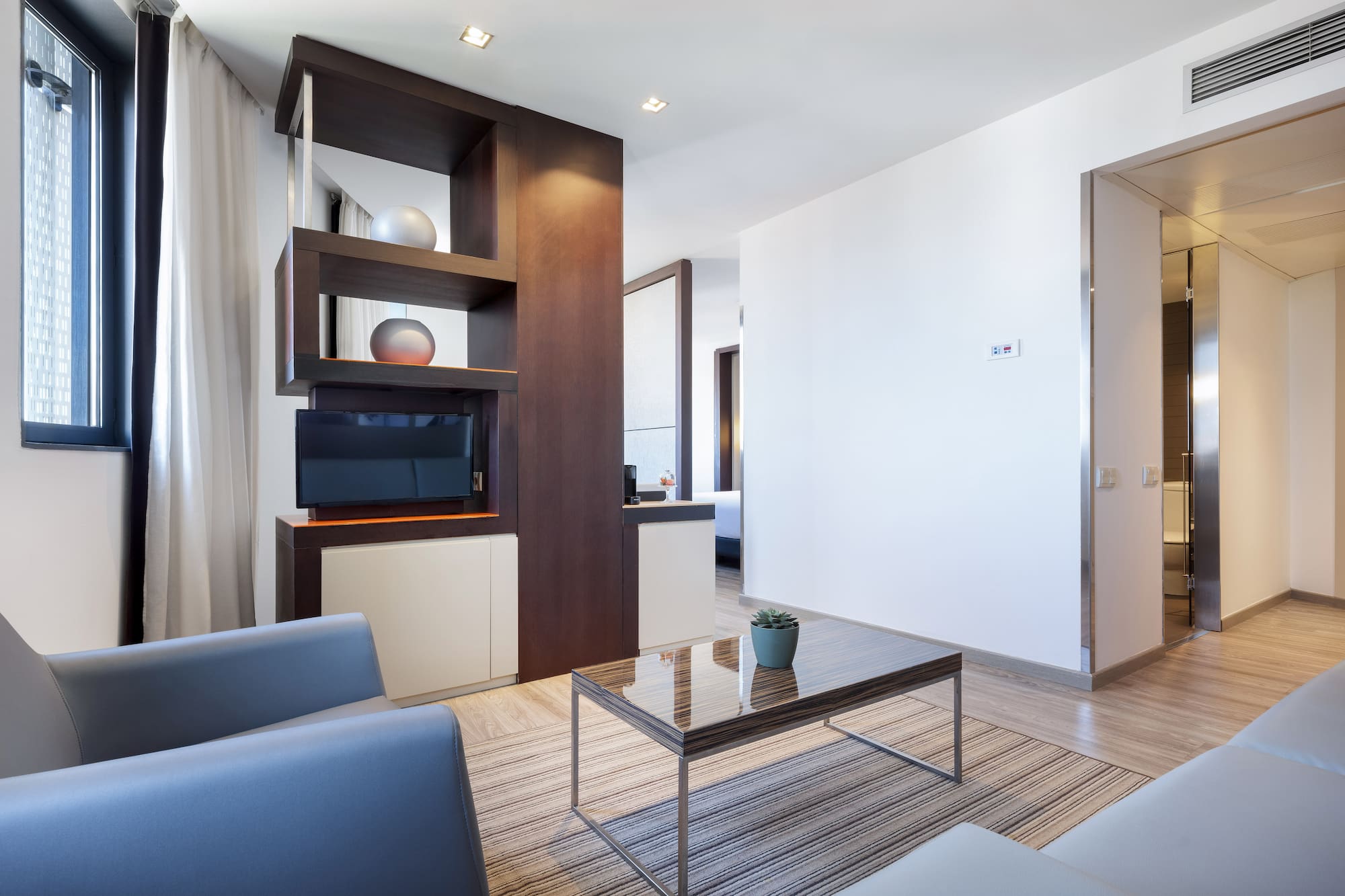 a living room with a couch and a coffee table