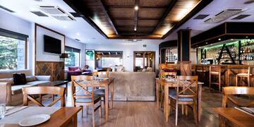 a room with tables and chairs