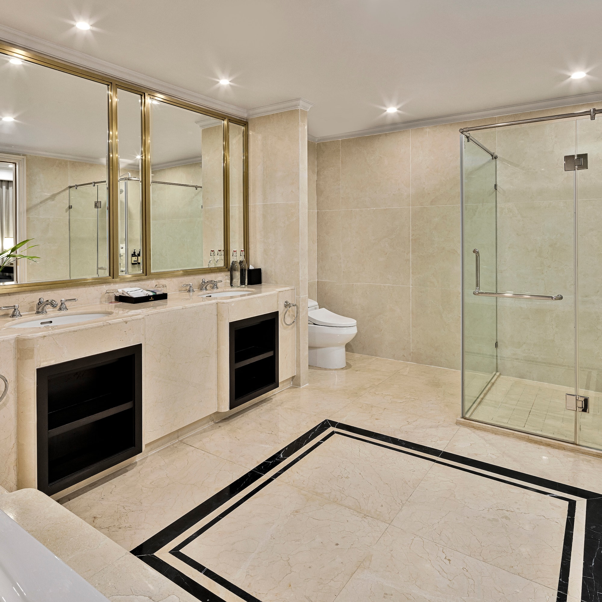 a bathroom with a shower and sink