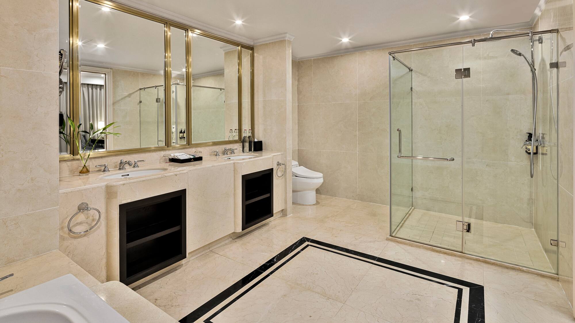 a bathroom with a shower and sink