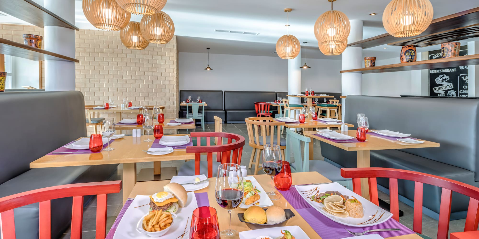 a restaurant with tables and chairs