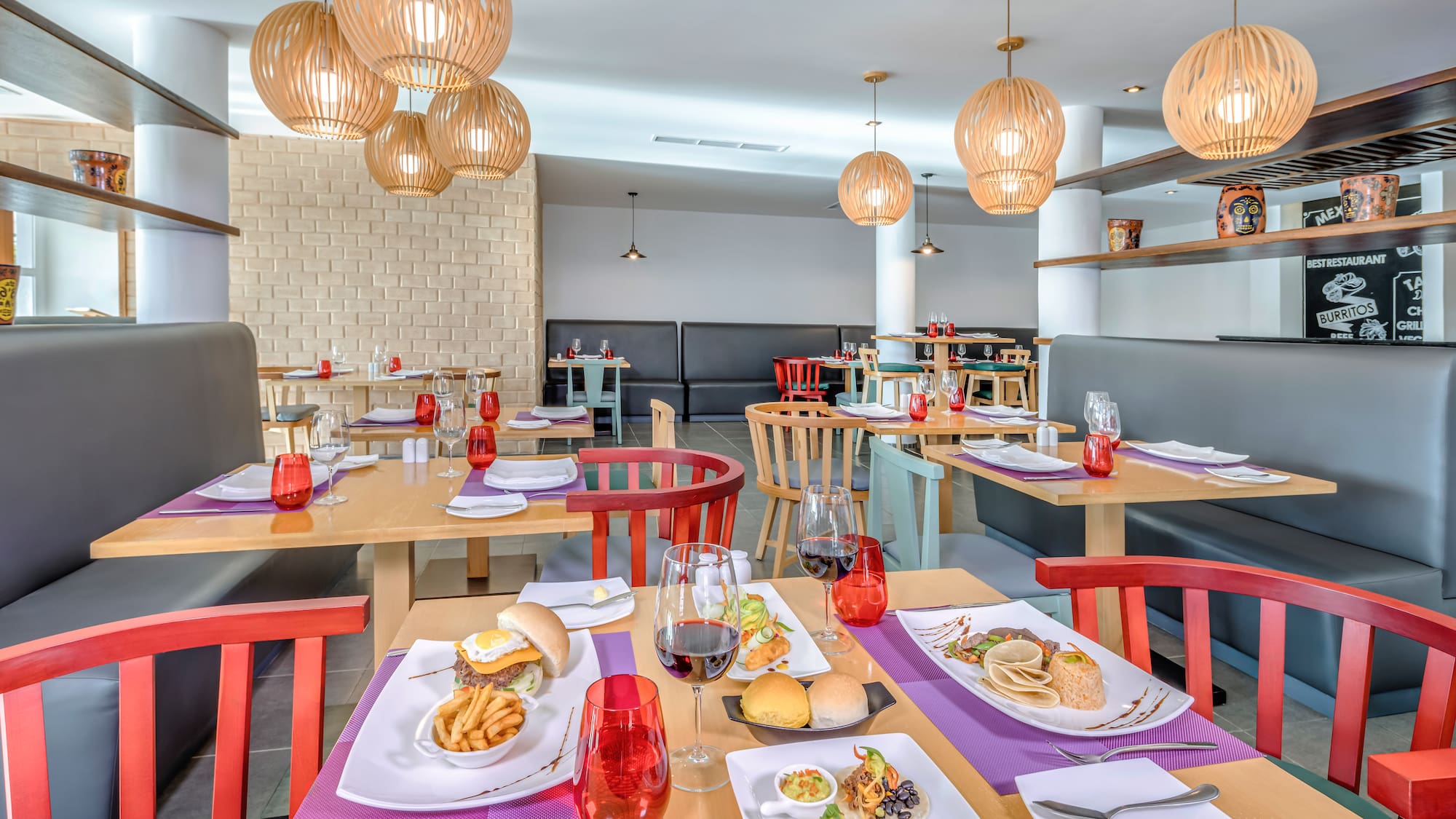 a restaurant with tables and chairs