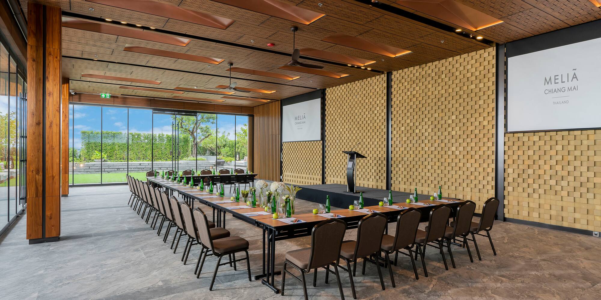 a room with a large table and chairs