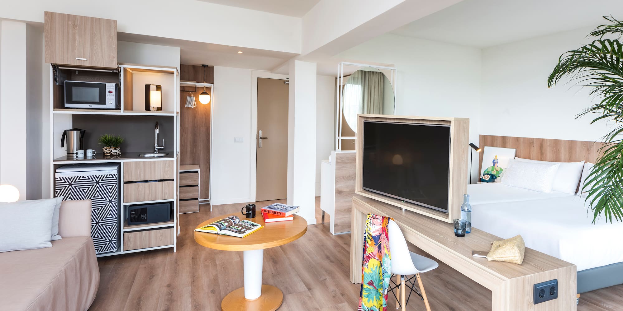 a room with a tv and a table