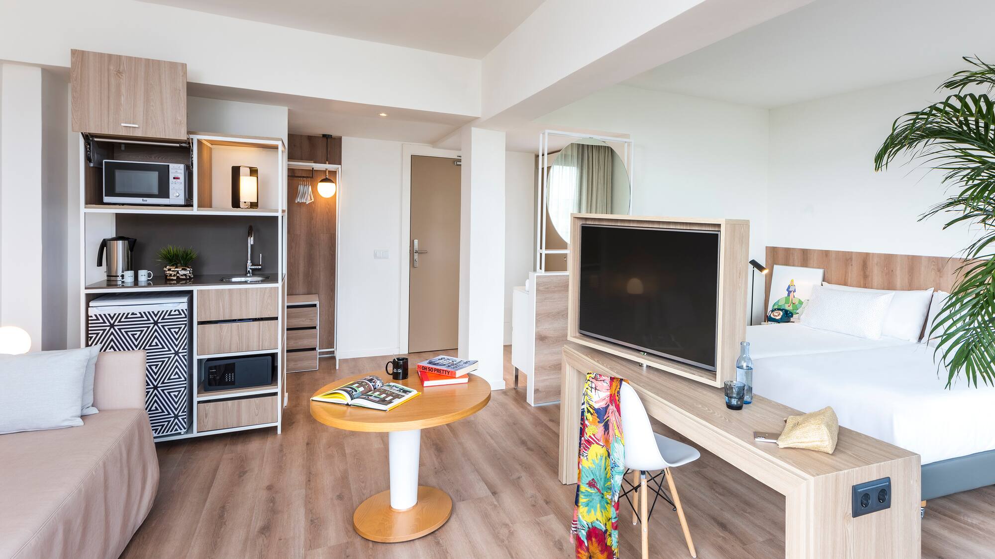 a room with a tv and a table