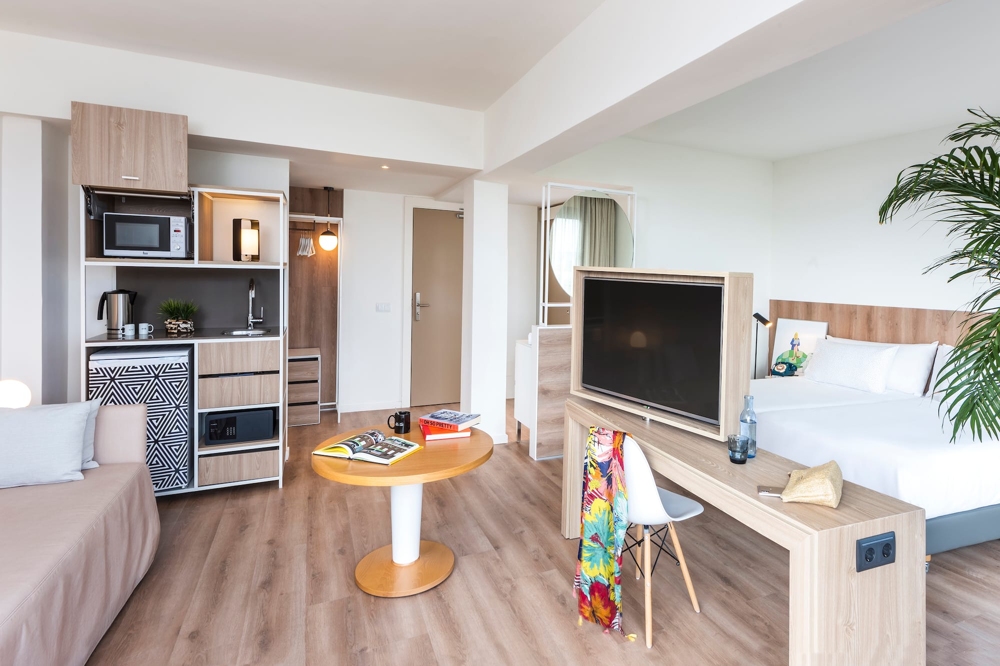 a room with a tv and a table