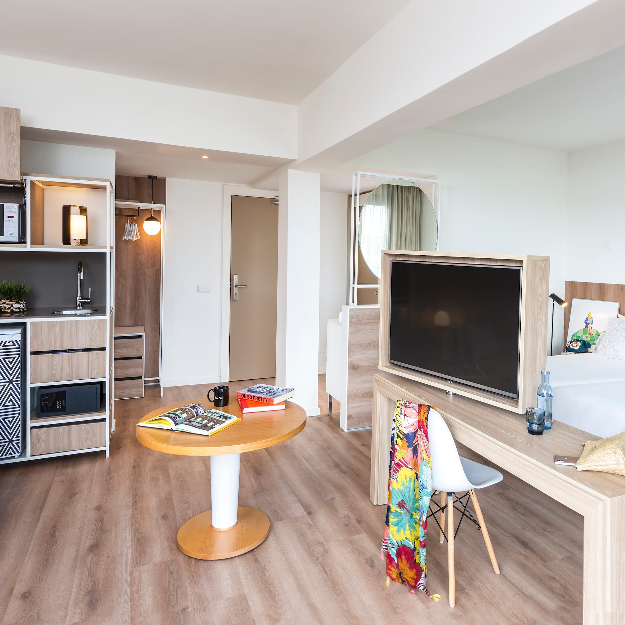 a room with a tv and a table