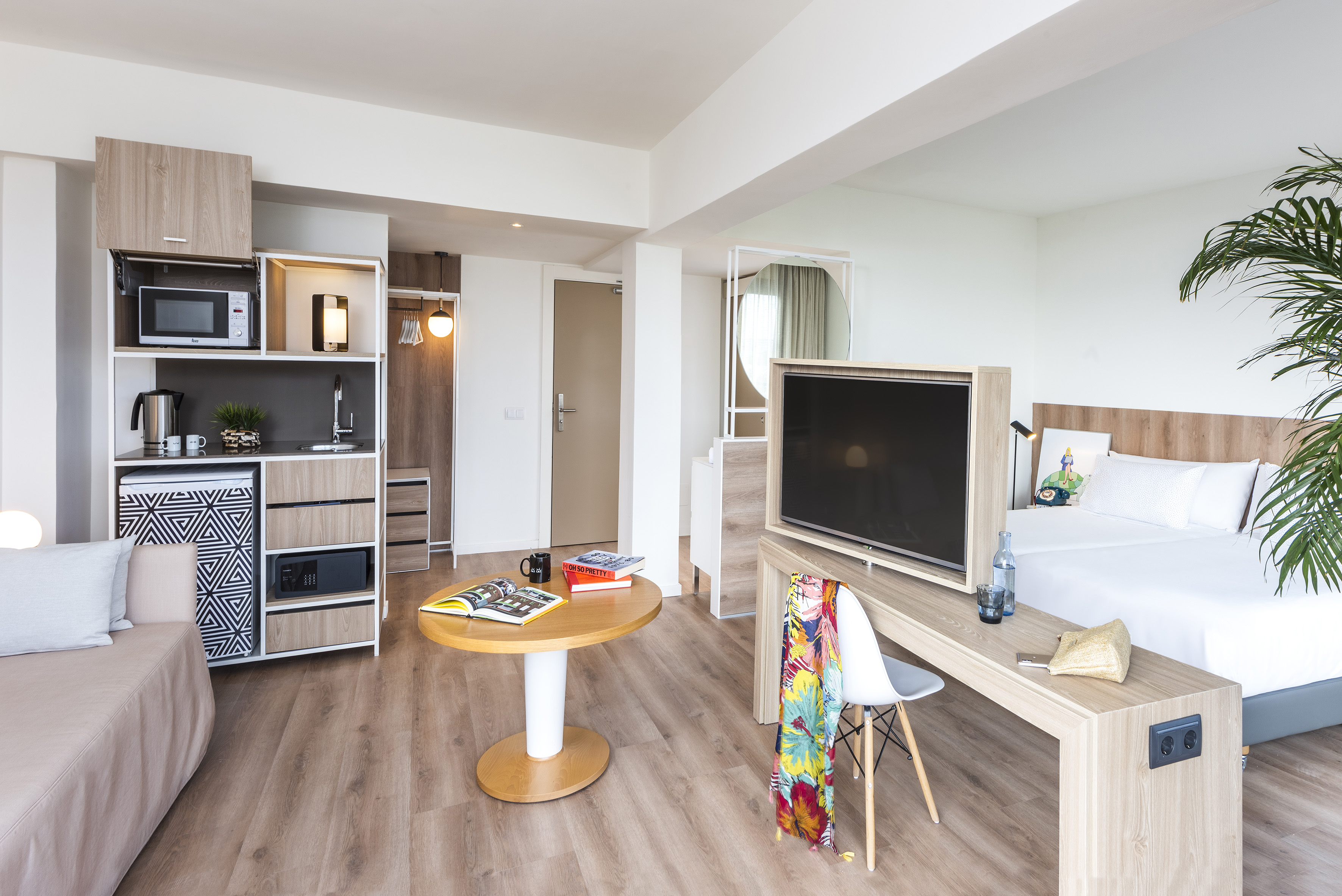 a room with a tv and a table