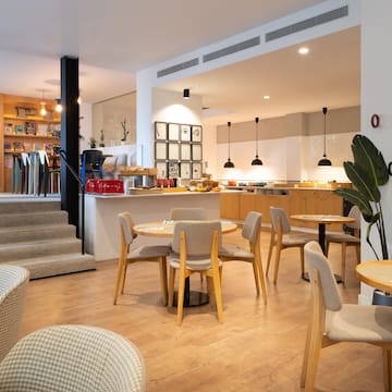 a room with tables and chairs