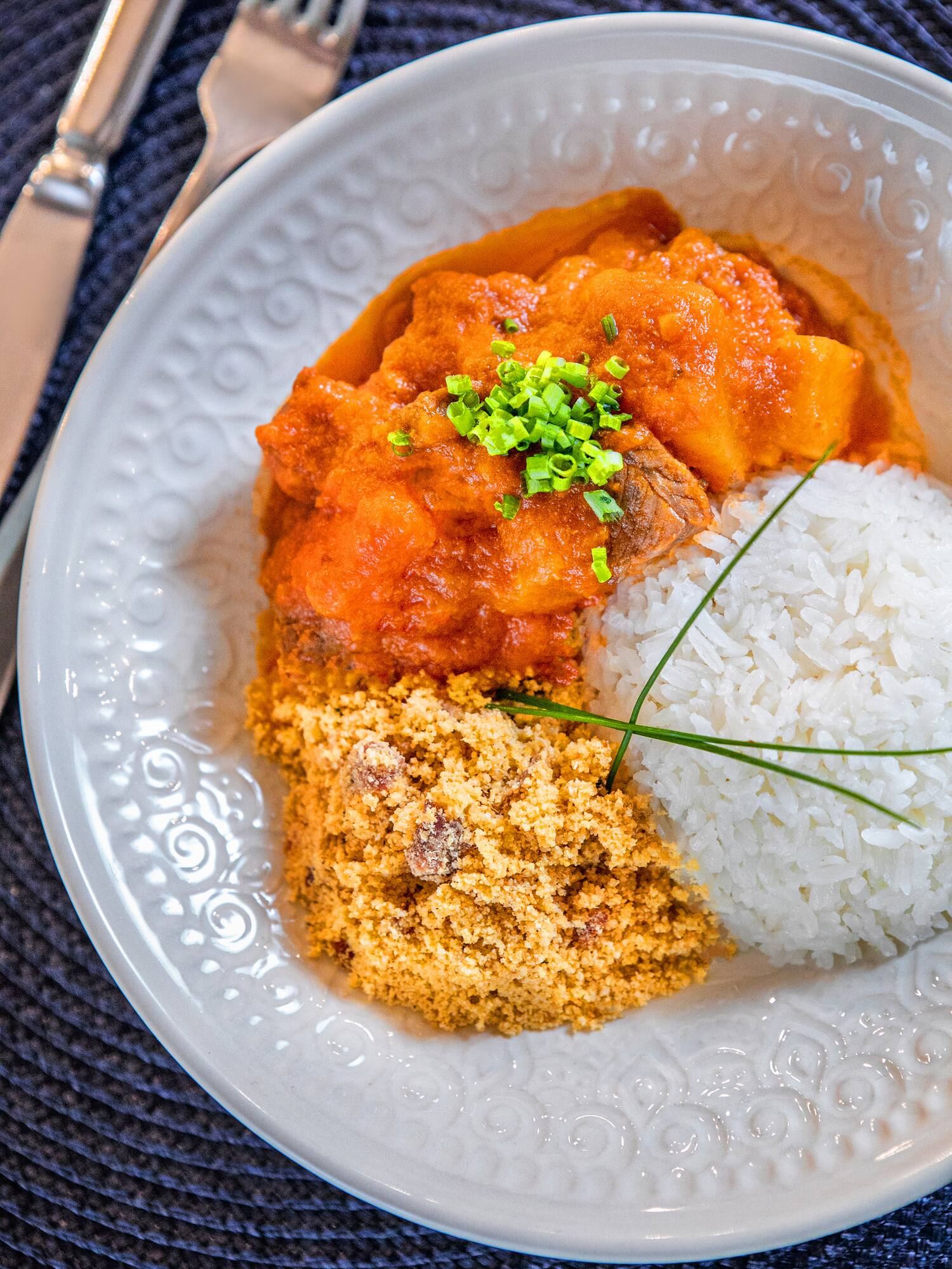 a plate of food with a fork and knife