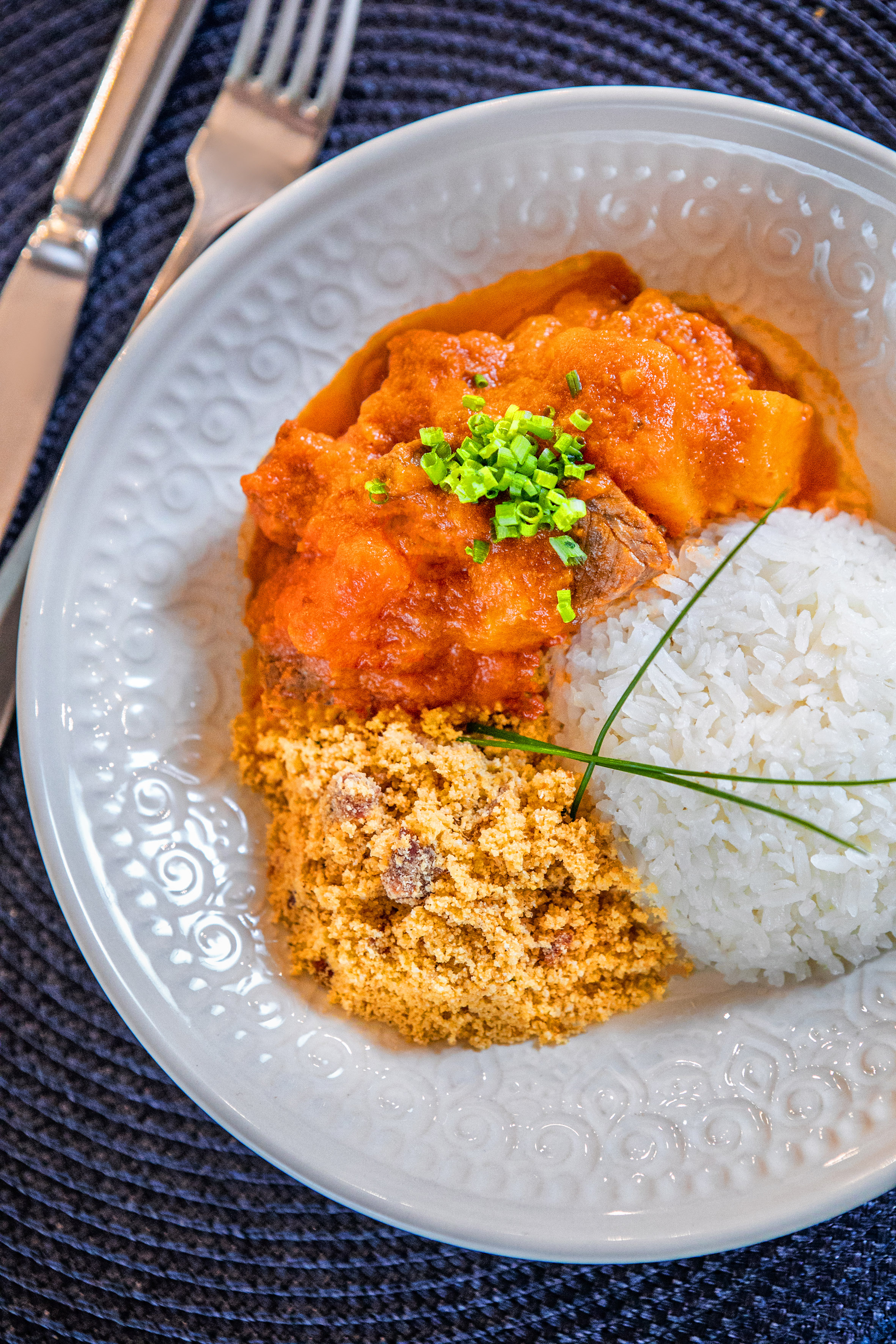 a plate of food with a fork and knife