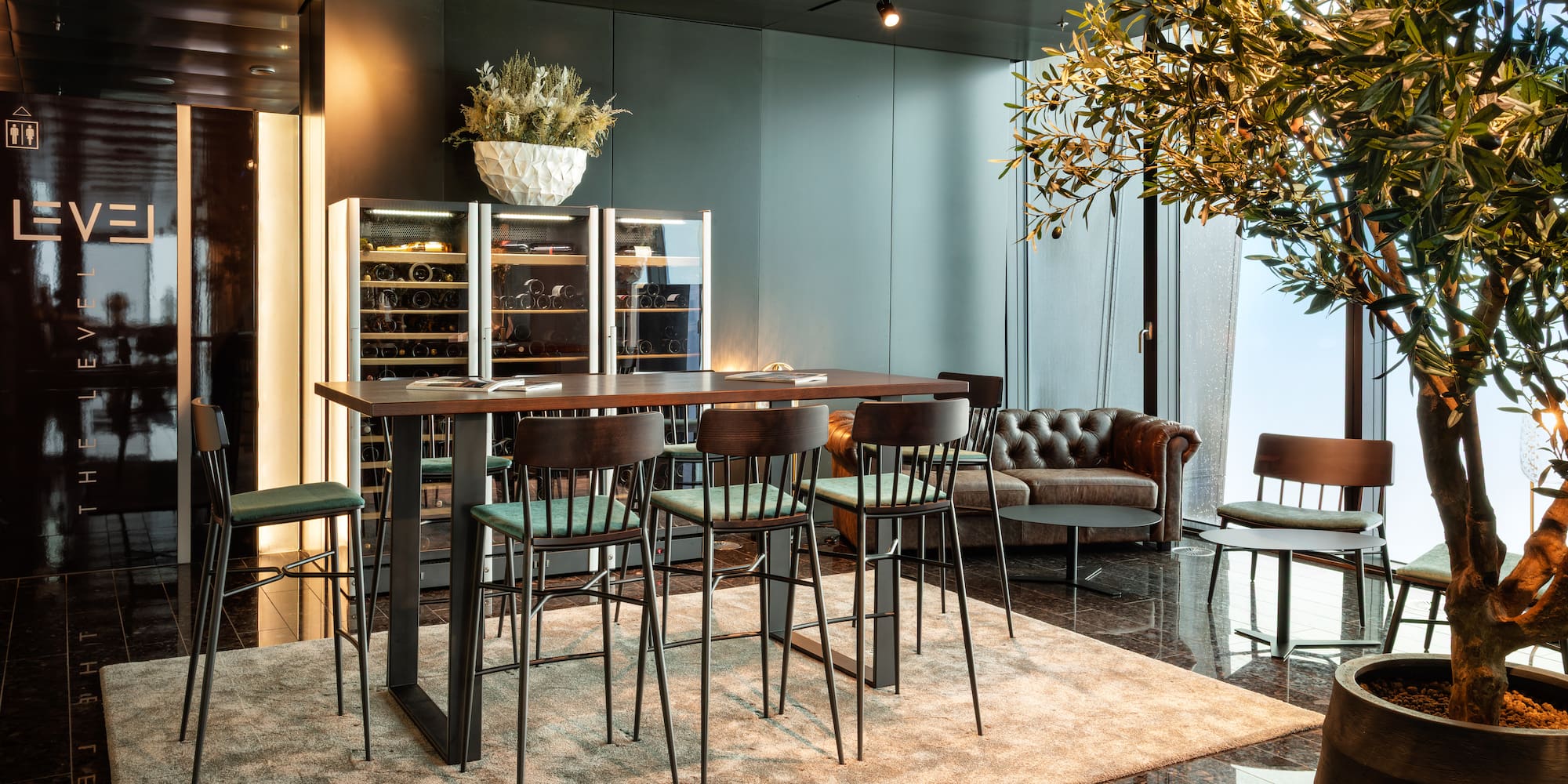 a room with a table and chairs