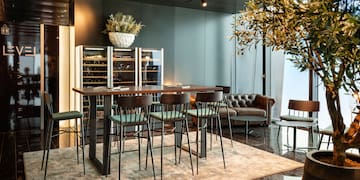 a room with a table and chairs