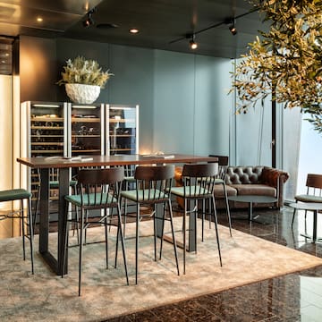 a room with a table and chairs