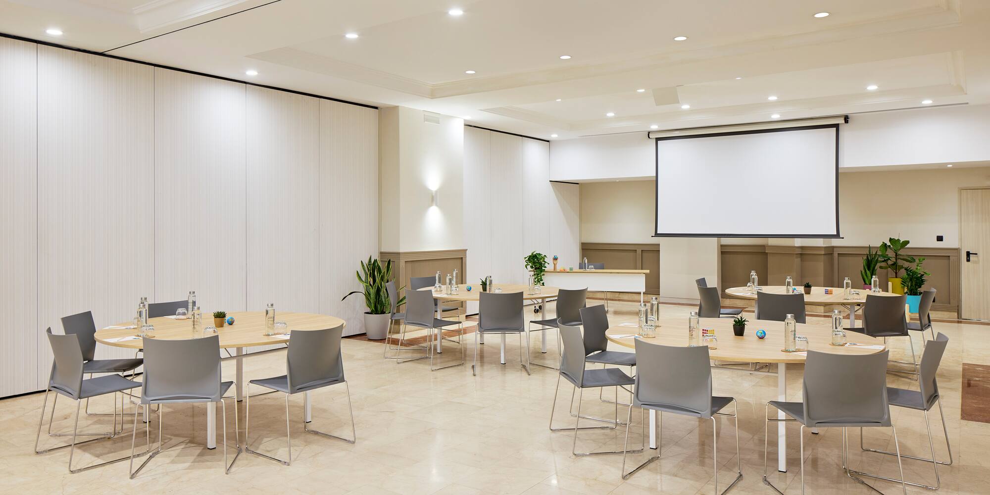 a room with tables and chairs