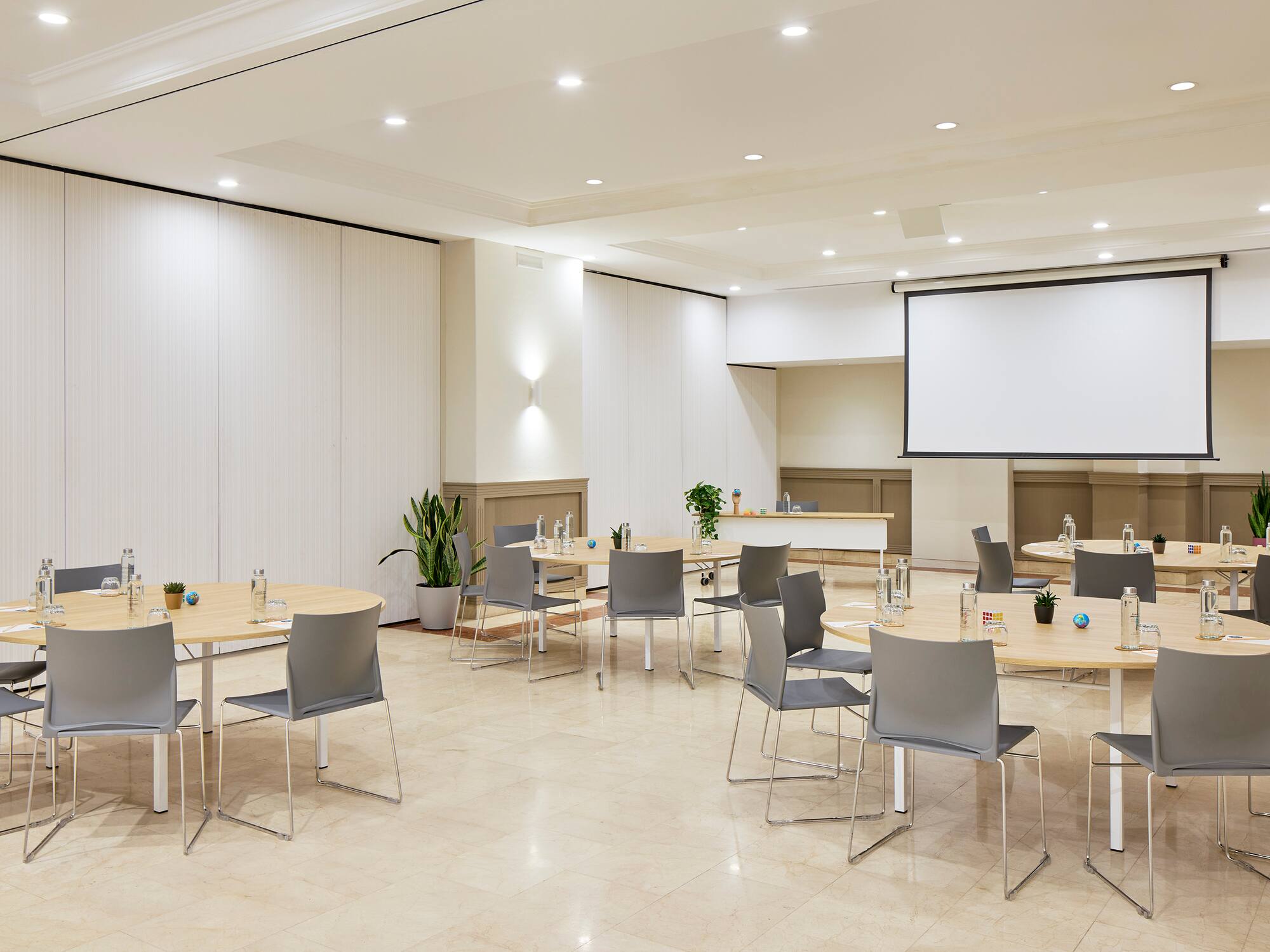 a room with tables and chairs