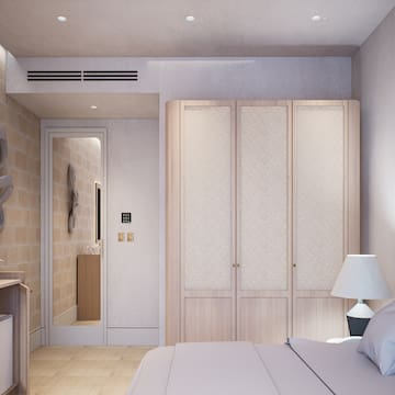 a bedroom with a bed and a closet