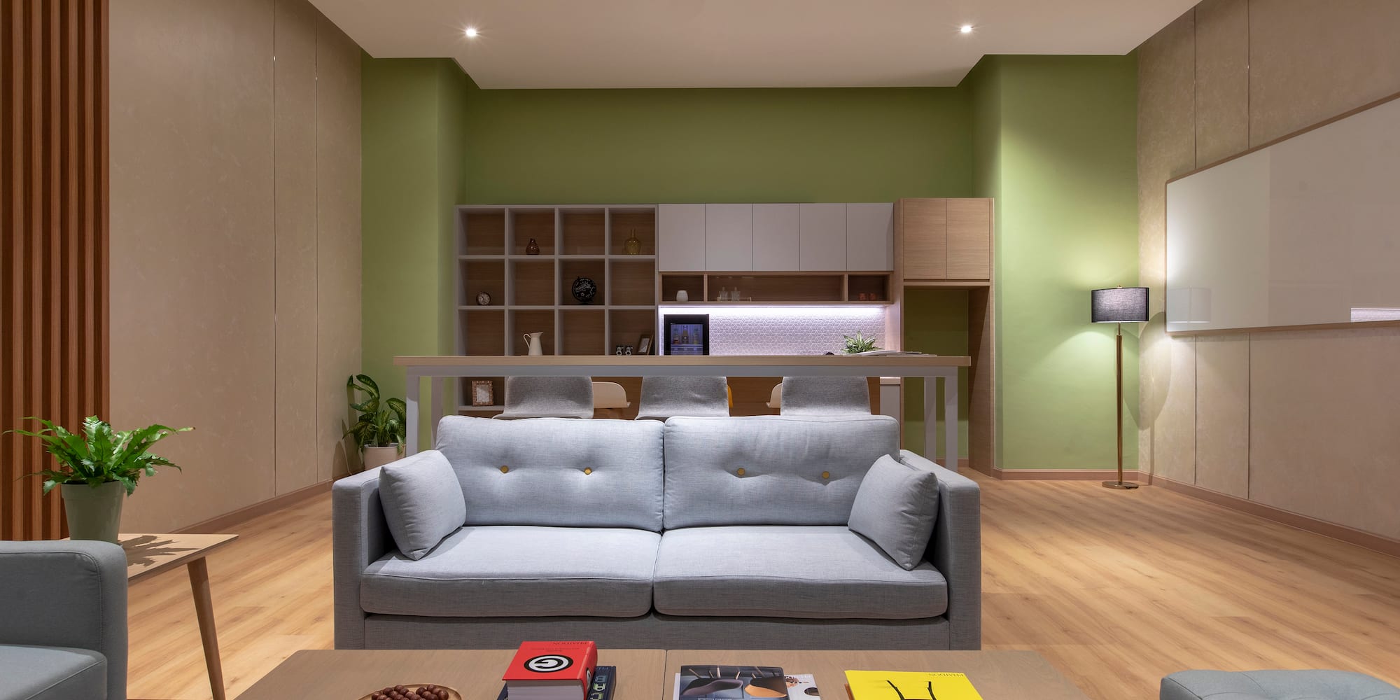 a living room with a couch and a table