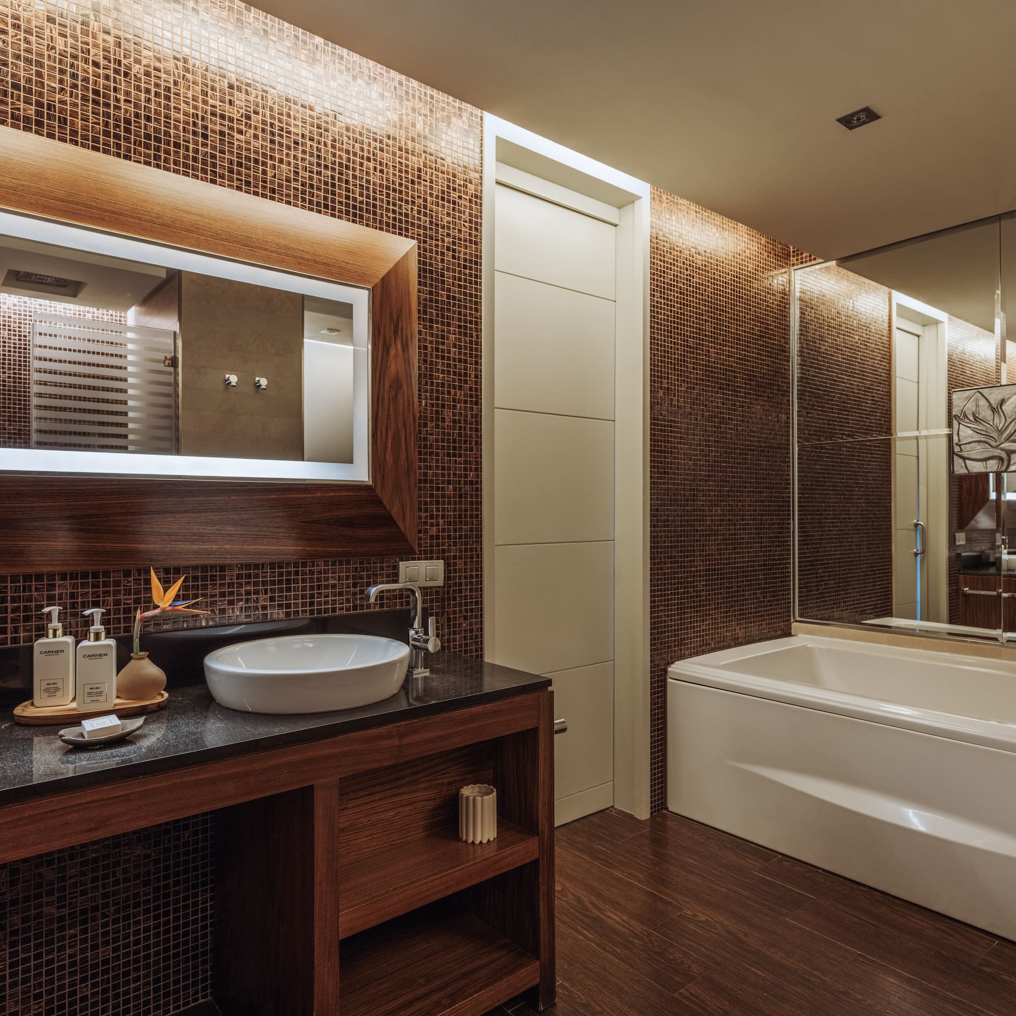 a bathroom with a sink and a bathtub.