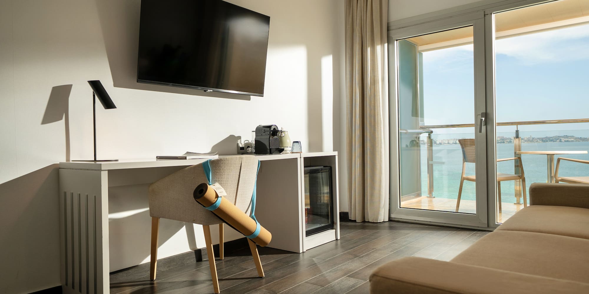 a room with a television and a chair