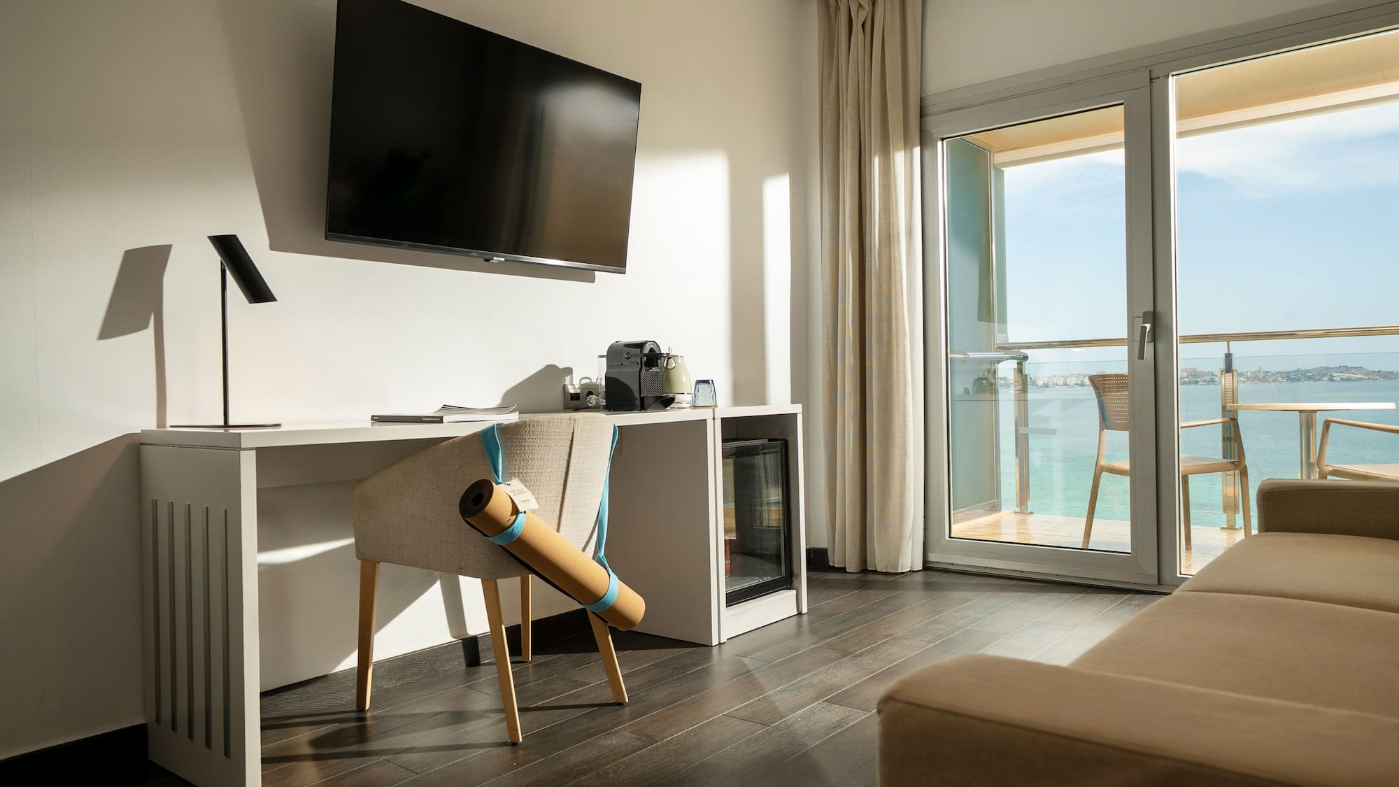 a room with a television and a chair