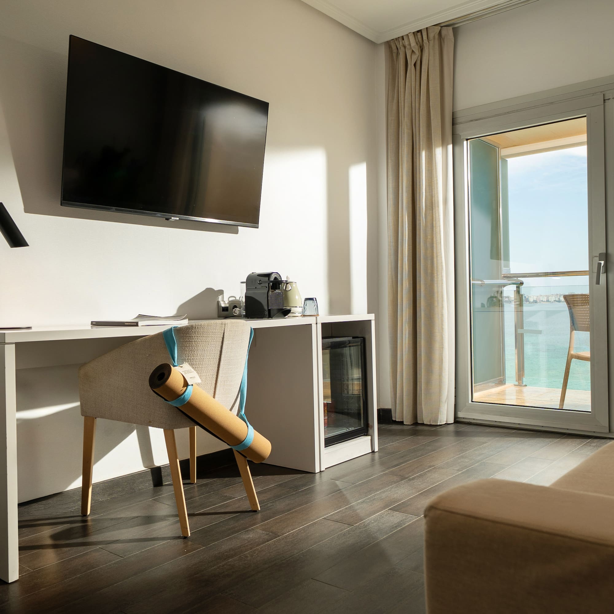 a room with a television and a chair