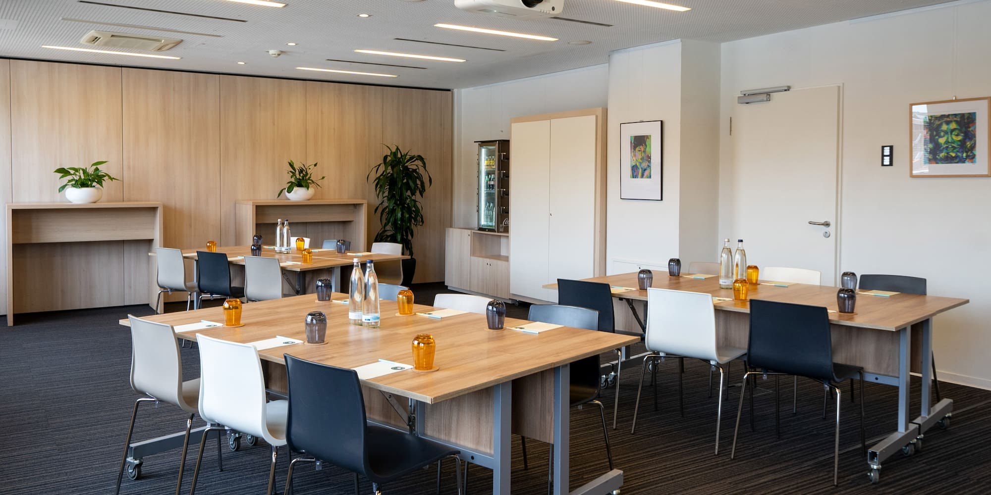 a room with tables and chairs