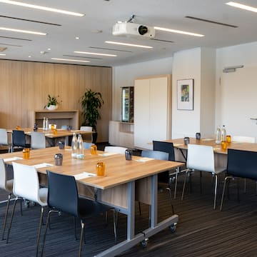 a room with tables and chairs