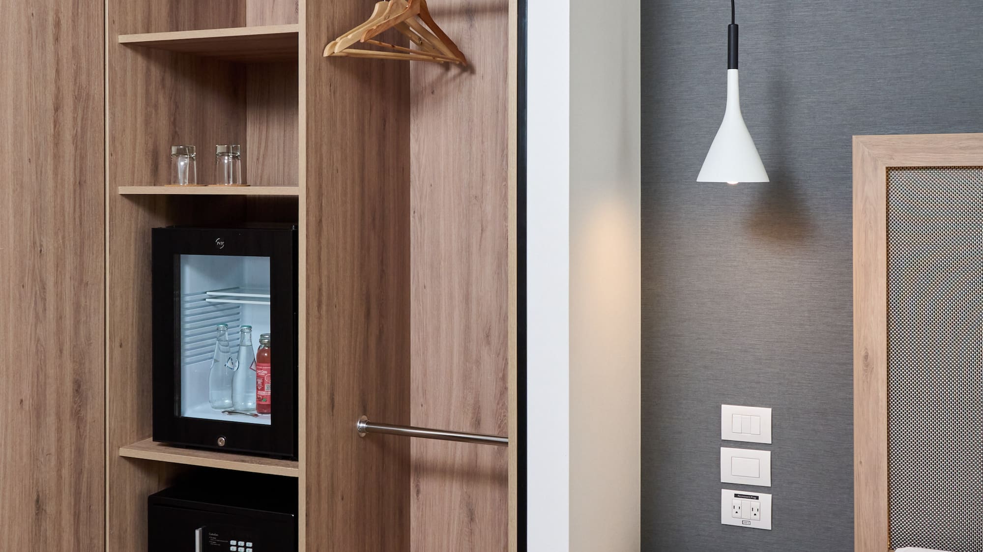 a room with a closet and a bed