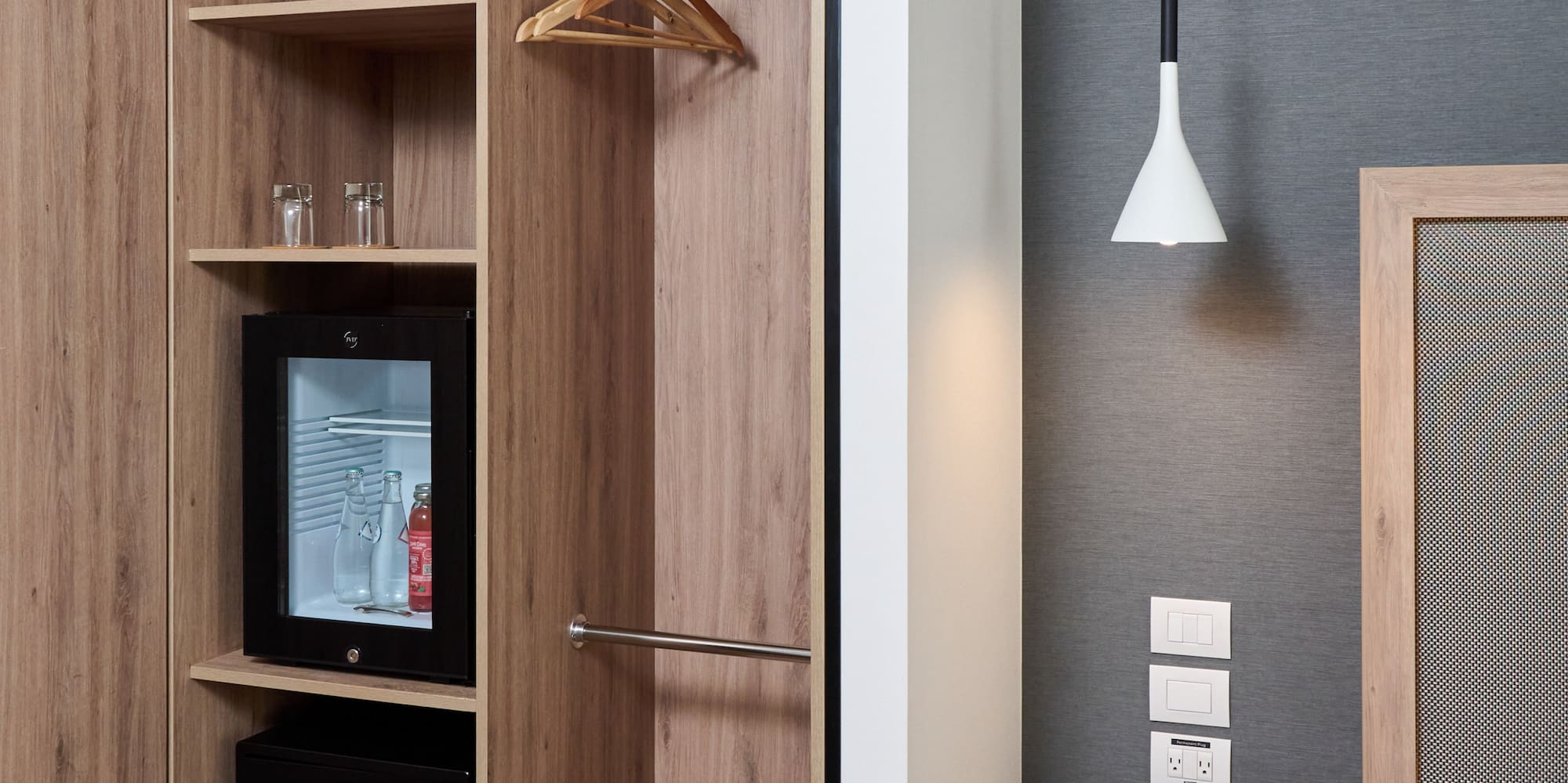 a room with a closet and a bed