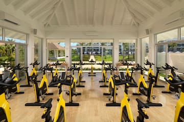 a room with exercise bikes