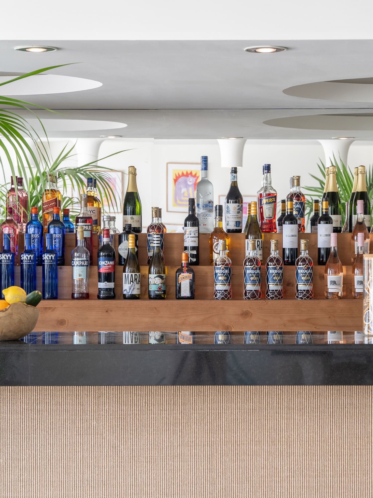 a bar with bottles of alcohol