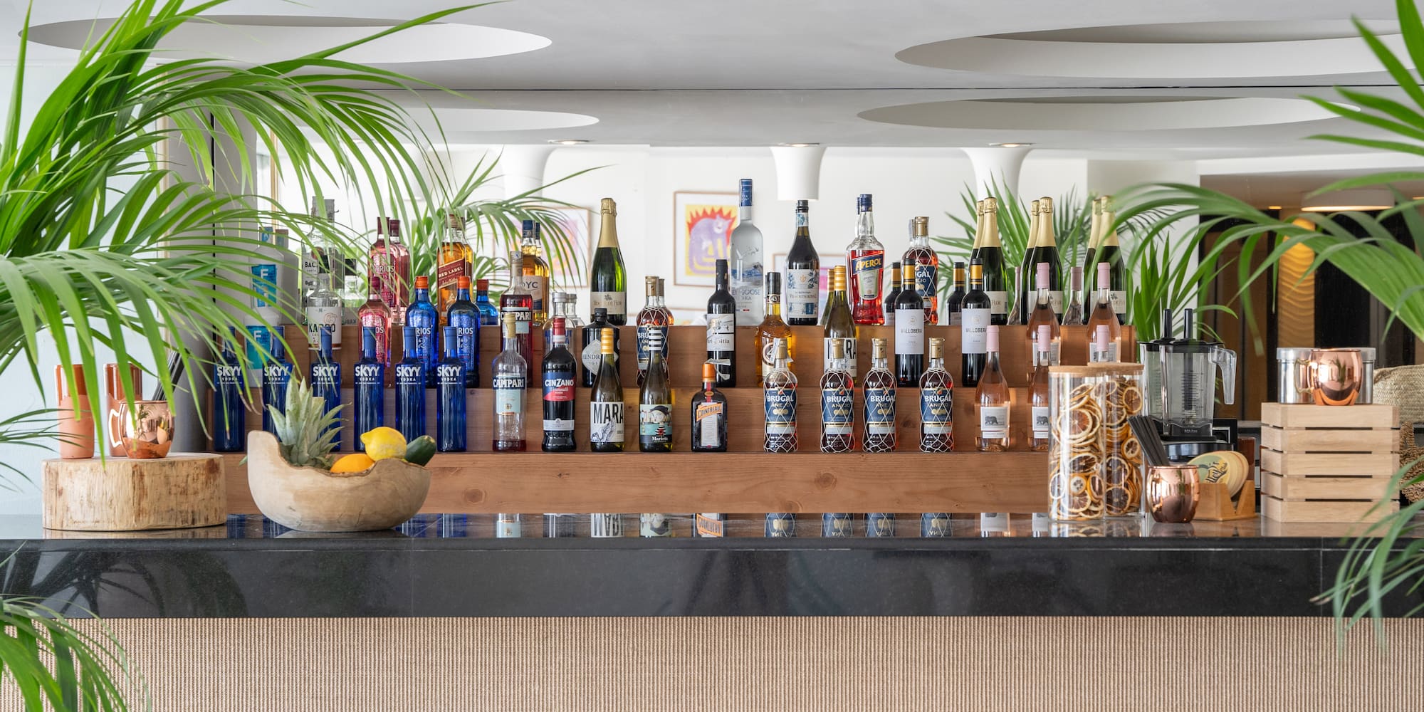 a bar with bottles of alcohol