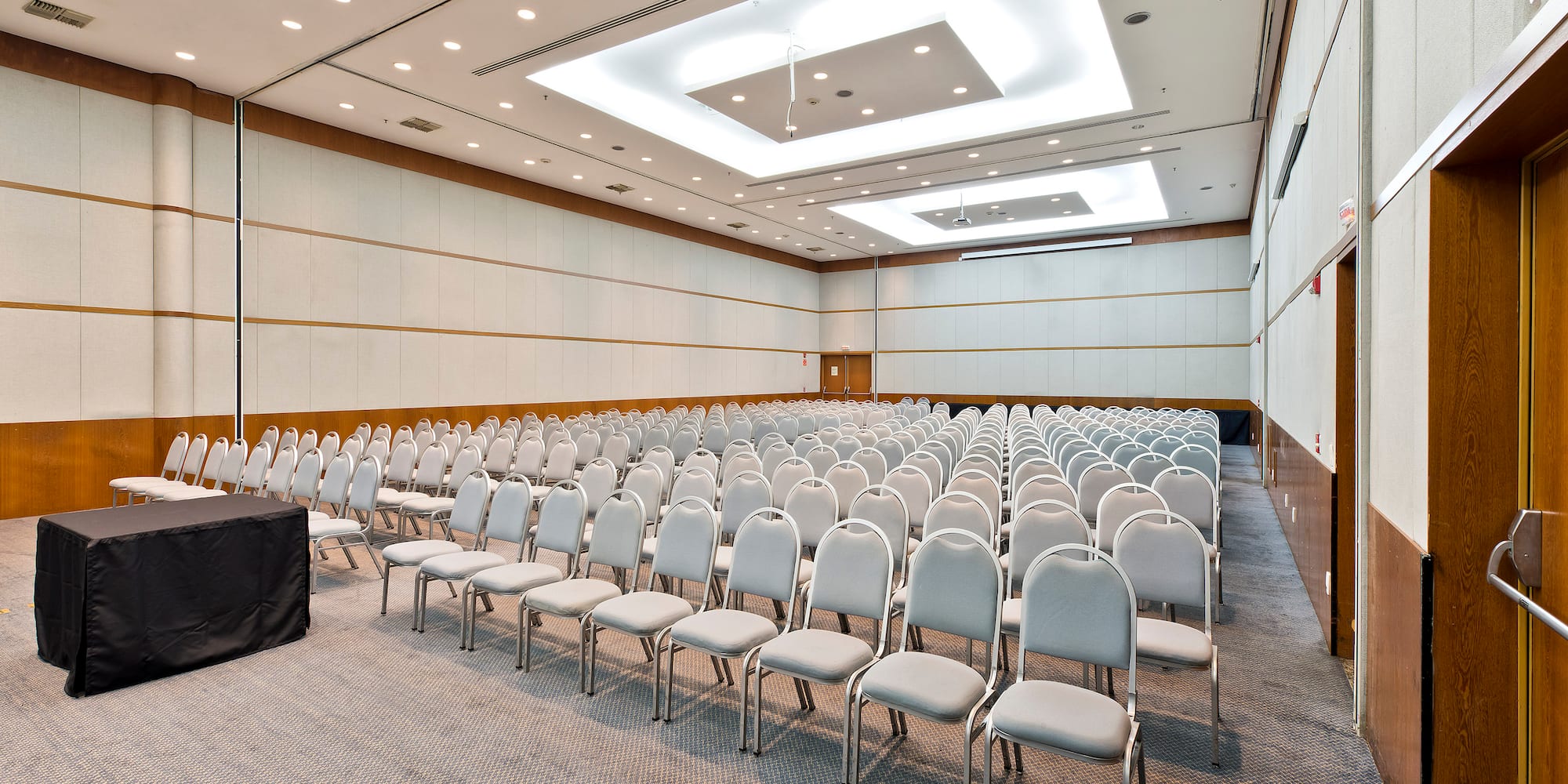 a room with rows of chairs