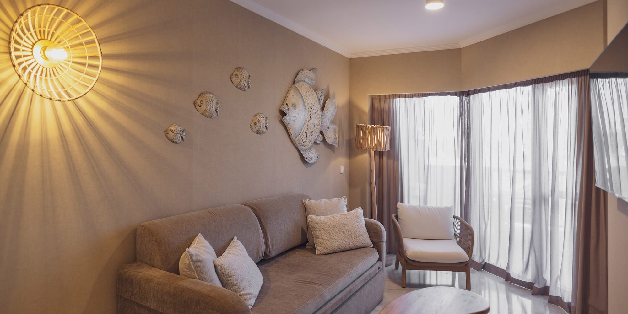 a living room with a couch and a table