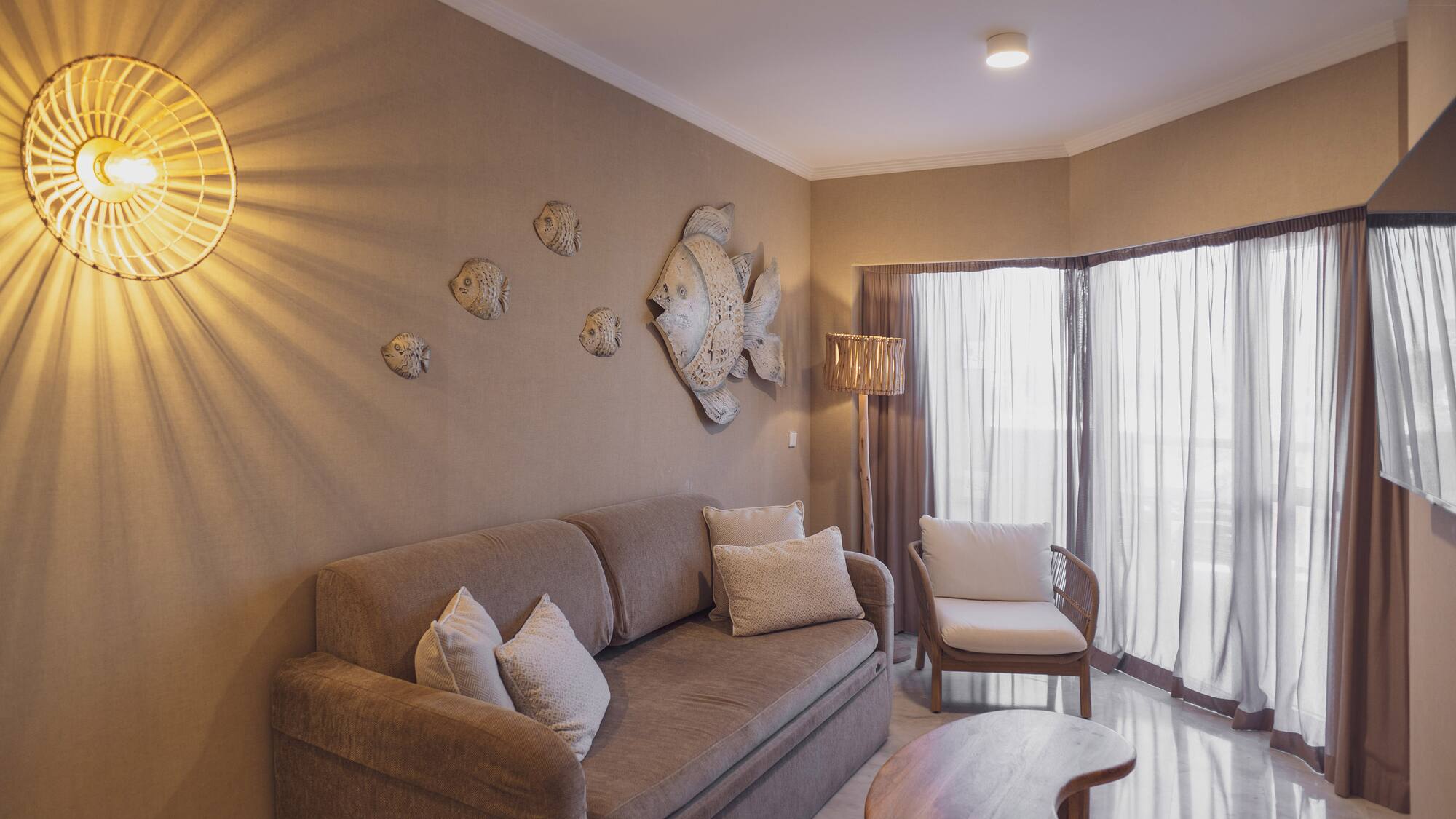 a living room with a couch and a table