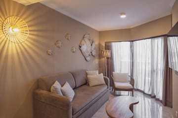 a living room with a couch and a table