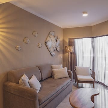 a living room with a couch and a table