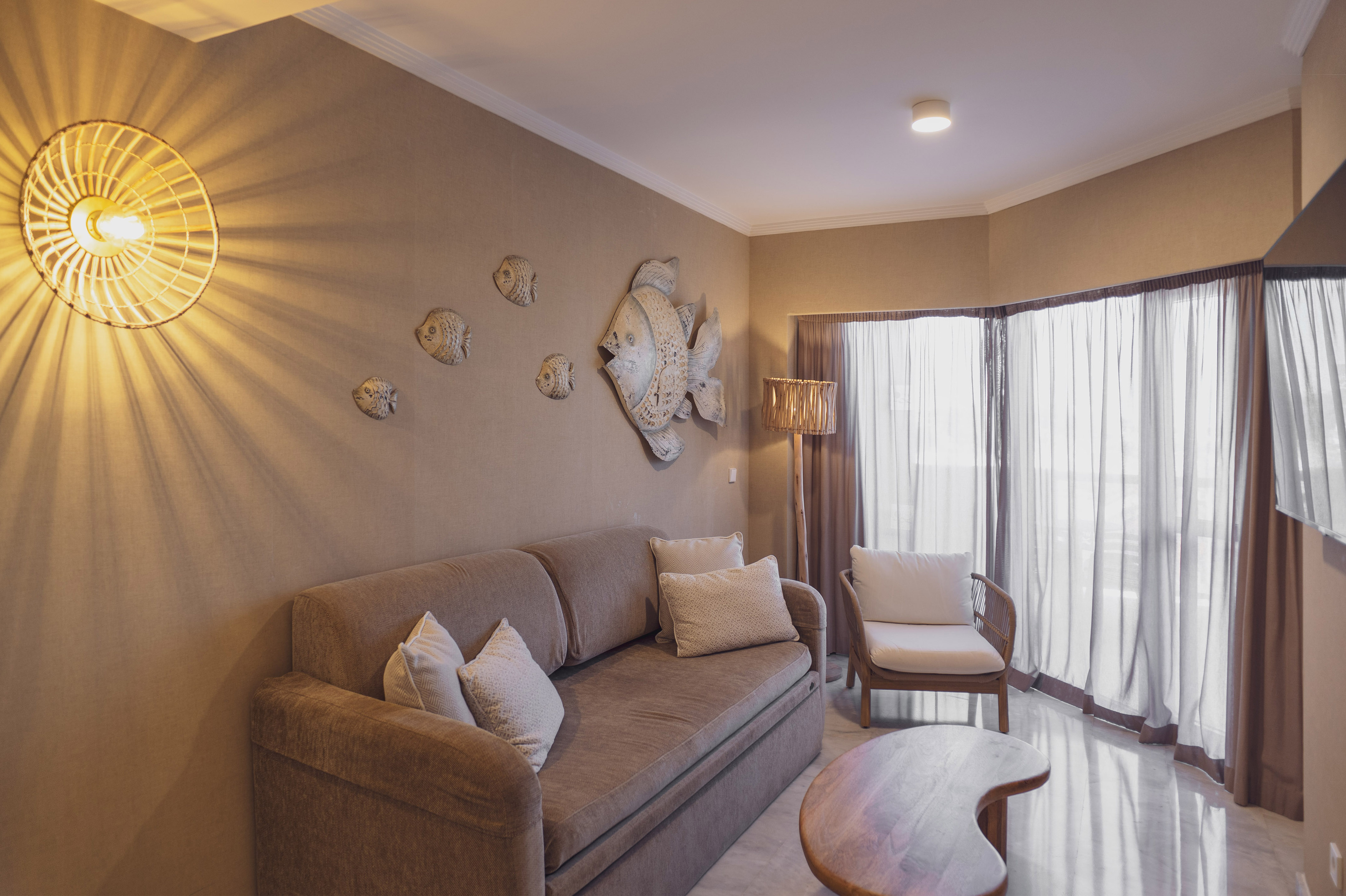 a living room with a couch and a table