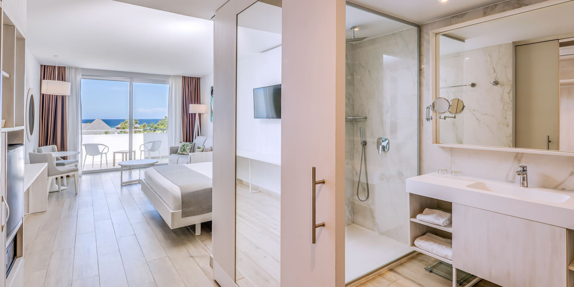 a bathroom with a large glass door