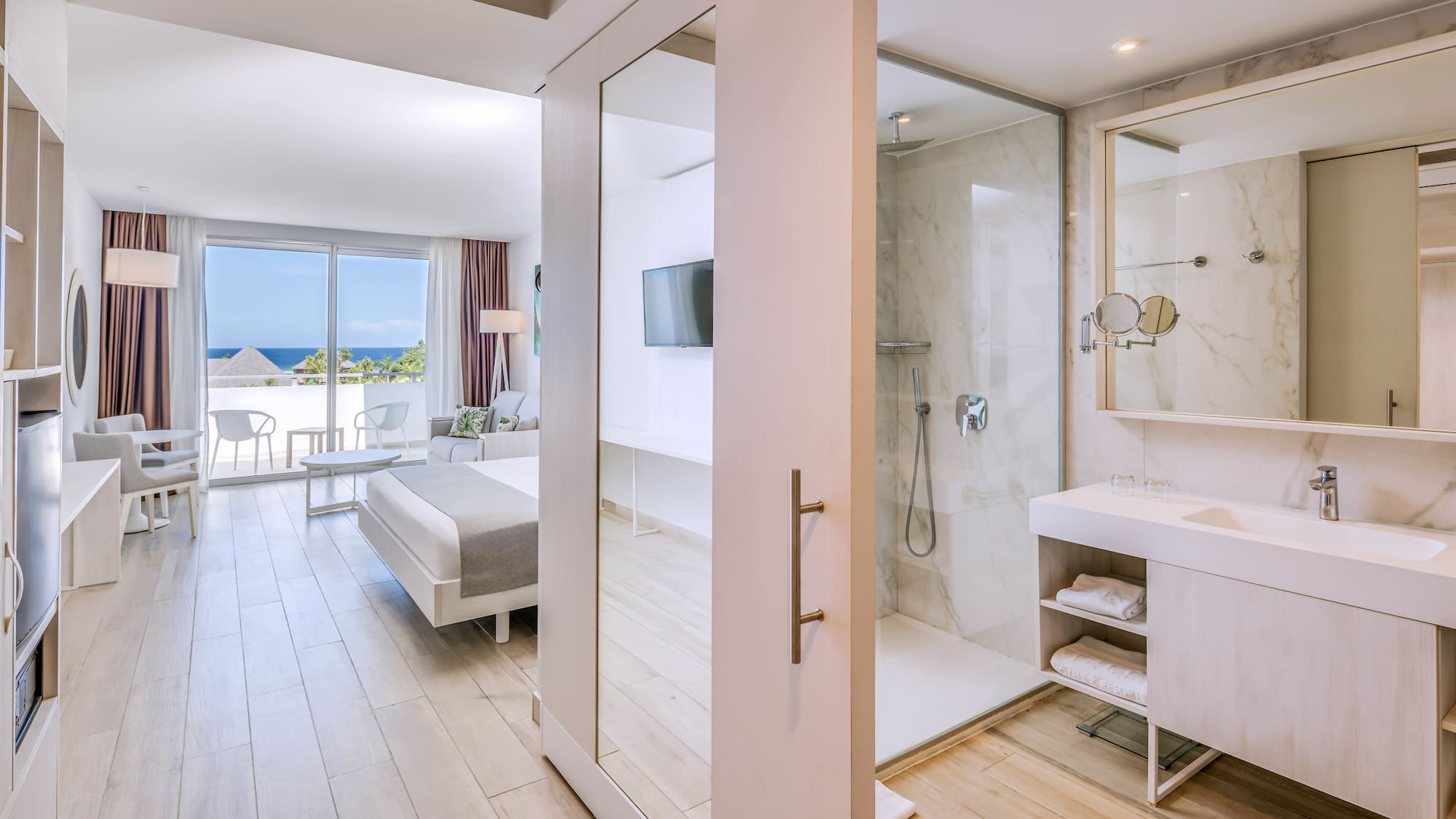 a bathroom with a large glass door