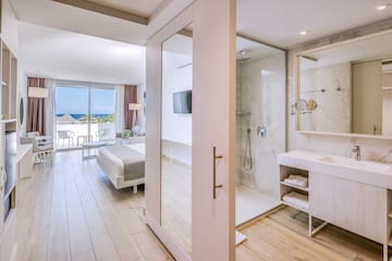 a bathroom with a large glass door