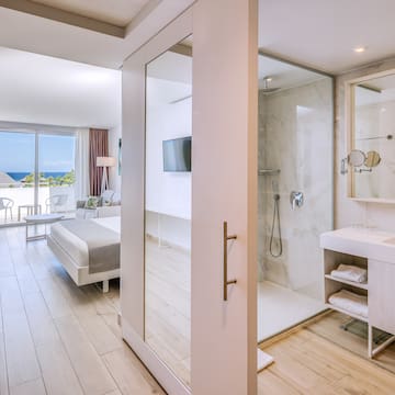 a bathroom with a large glass door