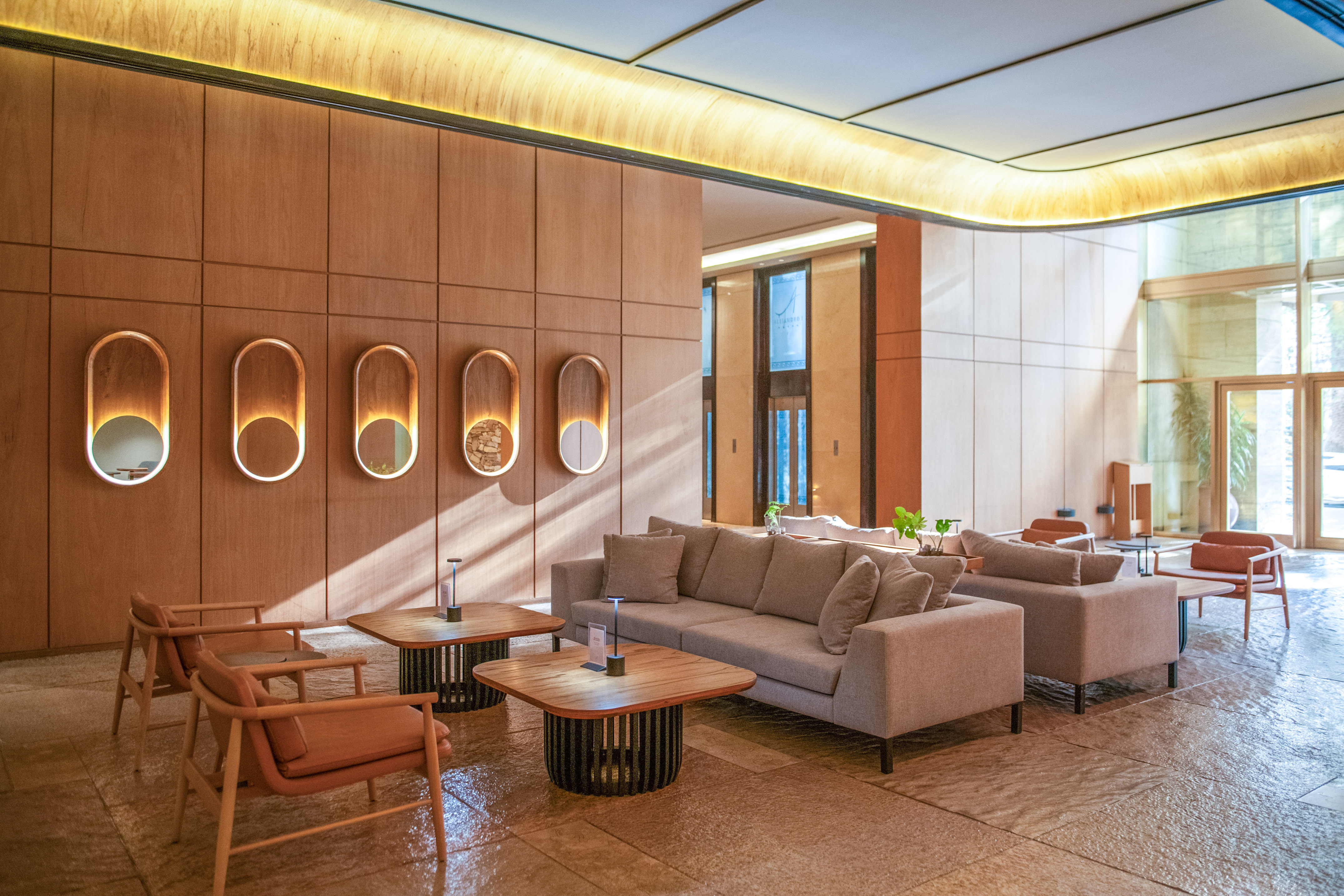 a room with couches and tables