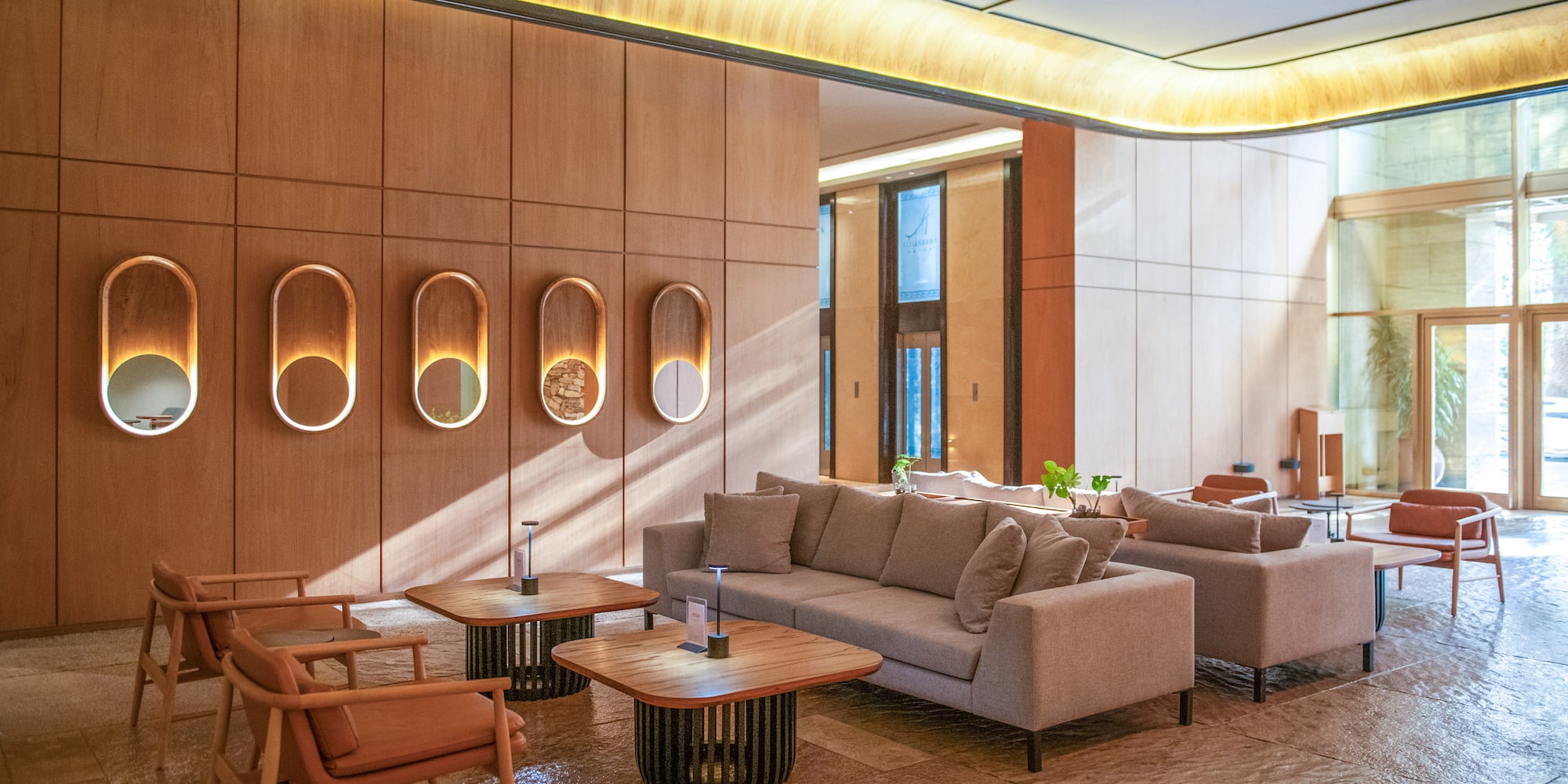 a room with couches and tables