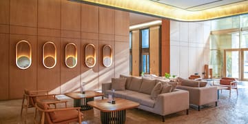 a room with couches and tables