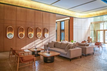 a room with couches and tables