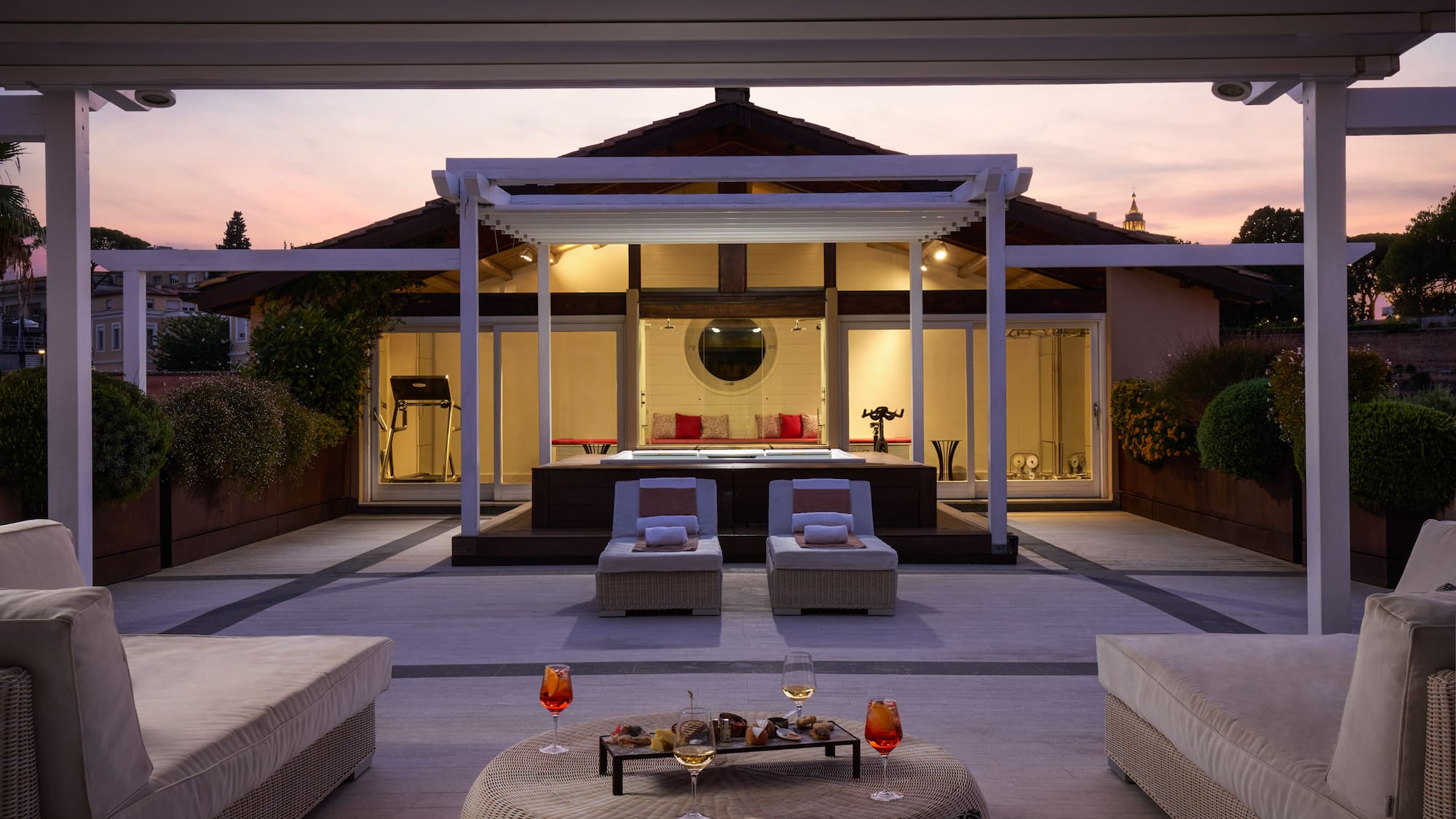 a patio with a large deck and a large pool